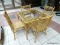 WICKER AND RATTAN PATIO TABLE SET WITH GLASS INSERT TOP ON THE TABLE. CHAIRS MEASURE 17 IN X 21 IN X