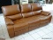 BRAND NEW TOP GRAIN LEATHER POWER RECLINING SOFA BY ABBYSON. HAS PAPERWORK. MEASURES 87 IN X 34 IN X