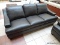 BRAND NEW MERONA LEATHER SOFA IN GRAY. INTRODUCE SLEEK MID-CENTURY STYLE TO YOUR LIVING SPACE WITH