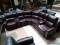 BRAND NEW BRADLEY TOP GRAIN LEATHER POWER RECLINING SECTIONAL IN MAROON. INSTANTLY TRANSFORM YOUR