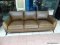 BRAND NEW MERONA LEATHER SOFA IN BROWN. INTRODUCE SLEEK MID-CENTURY STYLE TO YOUR LIVING SPACE WITH