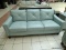 ATMORE LEATHER 3 CUSHION SOFA IN BLUE. A TIMELESS SILHOUETTE WITH ADDED ELEGANCE, INTRODUCING THE