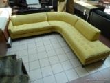 YELLOW UPHOLSTERED CORNER SECTIONAL SOFA WITH BUTTON TUFTED SEATS. MEASURES APPROXIMATELY 106 IN X