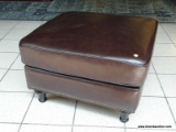 BRAND NEW MORTARA LEATHER OTTOMAN IN BROWN. A MODERN DESIGN COMBINED WITH LUXURIOUS, COMFORTABLE