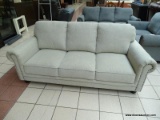 BRAND NEW GRAY DEANA FABRIC SOFA. THE DEANA FABRIC SOFA WAS MASTER-BUILT WITH COMFORT IN MIND.