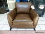 BRAND NEW MERONA LEATHER CHAIR IN BROWN. INTRODUCE SLEEK MID-CENTURY STYLE TO YOUR LIVING SPACE WITH