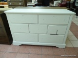 LM CO. HOME WHITE 7 DRAWER DRESSER. HAS THE PULLS FOR THE DRAWERS INSIDE. MEASURES 57.5 IN X 19 IN X