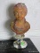 (FOYER) FIGURAL BUST ON STAND; VINTAGE PLASTER BUST ON MARBLE STAND- 16 IN H, ITEM IS SOLD AS IS