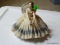 (LR) DRESDEN PORCELAIN SEATED LADY- 5.5 IN H.,ITEM IS SOLD AS IS WHERE IS WITH NO GUARANTEES OR