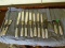 (DR) 12 SHELTON CUTLERY STERLING AND MOTHER OF PEARL HANDLED KNIVES, ITEM IS SOLD AS IS WHERE IS