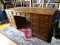 (OFFICE) ANTIQUE MAHOGANY LATE 19TH CEN. 9 DRAWER EXECUTIVE DESK, PANELED SIDES AND FRONT RESTING ON