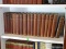 (OFFICE) SHELF LOT OF 15 LEATHER AND MARBLEIZED PAPER BOUND 1896 EDITION OF VARIOUS BOOKS ON