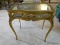 (LR) ANTIQUE GOLD GILT AND CARVED LIFT TOP DISPLAY TABLE WITH BEVELED GLASS TOP 29 IN X 20 IN X 29