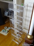 (OFFICE) PLASTIC VHS OR DVD TOWER- 8 IN X 7 IN X 34 IN, ITEM IS SOLD AS IS WHERE IS WITH NO
