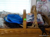 (BED1) BASKETS AND CONTENTS- BASKETVILLE PETAL BASKET AND INCLUDES 2 NEW I PLASTIC CLOTH HANDBAGS,