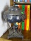 (FAM) SILVERPLATE HOT WATER URN WITH LIONS HEAD HANDLES- 14 IN H, ITEM IS SOLD AS IS WHERE IS WITH