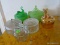 (KIT) LOT OF ASSORTED POWDER JARS WITH LIDS. 1 IS GREEN WITH A BALLERINA STYLE LID, 1 IS CLEAR WITH
