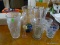 (KIT) LOT OF ASSORTED VASES TO INCLUDE A PINK DEPRESSION BUD VASE, A CRYSTAL VASE WITH IMAGES OF