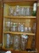 (KIT) CABINET LOT TO INCLUDE A PRESSED GLASS WATER PITCHER, TEA GLASSES, WATER GLASSES, FOSTORIA