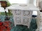 (SUN) WHITE PAINTED ORIENTAL STYLE SQUARE END TABLE/SIDE TABLE WITH FLORAL ACCENTS. MEASURES 24 IN X