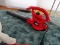 (SUN) BLACK & DECKER ELECTRIC POWERED LEAF BLOWER WITH ORANGE EXTENSION CORD. ITEM IS SOLD AS IS