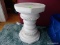 (SUN) WHITE PEDESTAL PLANT STAND. MEASURES 10 IN X 13 IN. ITEM IS SOLD AS IS WHERE IS WITH NO