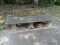 (OUT) 3 PEDESTAL BASE BENCH WITH A STONE SLAB TOP. MEASURES 78 IN X 24 IN X 16 IN. ITEM IS SOLD AS