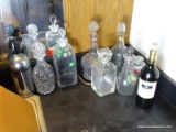 (FAM) 6 DECANTERS, SOME WITH LIQUOR TAGS ( ONE IS STERLING WITH COLONIAL WILLIAMSBURG MARK- CW),