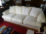 (FAM) WHITE STRIPPED AND GOLD TASSEL SLEEP SOFA- 89 IN X 33 IN X 35 IN, ITEM IS SOLD AS IS WHERE IS