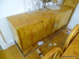 (KIT) BIRDS EYE MAPLE 4 DOOR CREDENZA WITH CHROME BASE. MEASURES 66 IN X 18 IN X 32 IN. ITEM IS SOLD