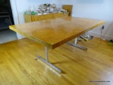 (KIT) BIRDSEYE MAPLE DINING TABLE WITH ONE 18 IN WIDE LEAF AND A CHROME BASE. WITH THE LEAF OUT