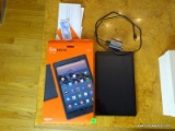 (KIT) AMAZON FIRE HD10 TABLET WITH BOX, CHARGER, AND 32 GB OF STORAGE. ITEM IS SOLD AS IS WHERE IS