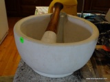 (KIT) LARGE STONE MORTAR WITH WOODEN HANDLE PESTLE AND AN EXTRA GLASS PESTLE. MORTAR MEASURES 13 IN