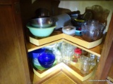 (KIT) CONTENTS OF CABINET TO INCLUDE A COLANDER, MEASURING CUPS, MIXING BOWLS, JARS, ETC. ITEM IS
