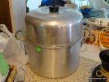 (KIT) 2 PIECE COOKING LOT TO INCLUDE A STOCK POT AND A METAL MIXING BOWL. ITEM IS SOLD AS IS WHERE