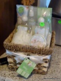 (KIT) LOTION/FRAGRANCE GIFT SET IN PLASTIC WITH WICKER CARRYING BASKET. APPEARS TO BE NEW. ITEM IS