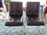 (SUN) PAIR OF BLACK LEATHER UPHOLSTERED AND CHROME CHAIRS WITH BUTTON TUFTED BACKS AND SEATS. EACH