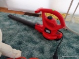 (SUN) BLACK & DECKER ELECTRIC POWERED LEAF BLOWER WITH ORANGE EXTENSION CORD. ITEM IS SOLD AS IS