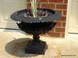 (OUT) CAST IRON PLANTER WITH FLORAL PATTERN. MEASURES 23 IN X 19 IN. ITEM IS SOLD AS IS WHERE IS