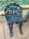 (OUT) ANTIQUE CAST IRON CHAIR WITH GRAPE THEME. MEASURES 18 IN X 18 IN X 28 IN. ITEM IS SOLD AS IS