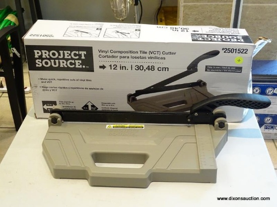 (R1) PROJECT SOURCE VINYL COMPOSITION TILE CUTTER. IS IN OPENED BOX. ITEM #2501522. ITEM IS SOLD AS