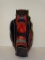SLAZENGER RED, BLACK AND GREY GOLF CLUB BAG. ITEM IS SOLD AS IS WHERE IS WITH NO GUARANTEES OR