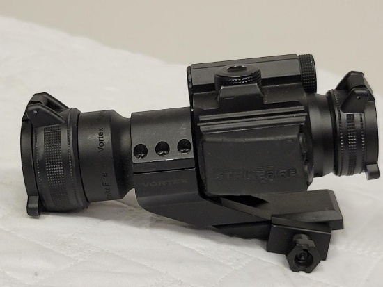 VORTEX STRIKEFIRE II RED DOT RETICLE . ITEM IS SOLD AS IS WHERE IS WITH NO GUARANTEES OR WARRANTY,