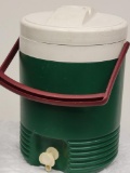 IGLOO GREEN 2 GALLON WATER JUG. ITEM IS SOLD AS IS WHERE IS WITH NO GUARANTEES OR WARRANTY, NO