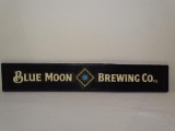 BLUE MOON BREWING COMPANY CO. BAR RUNNER DRIP MAT. 20.5 IN X 3.5 IN. ITEM IS SOLD AS IS WHERE IS