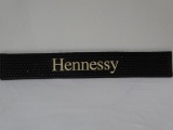 HENNESSY BAR RUNNER DRIP MAT. 23.5 IN X 3.5 IN. ITEM IS SOLD AS IS WHERE IS WITH NO GUARANTEES OR