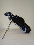 WALTER HAGEN GOLF CLUB BAG W SET OF GOLF CLUBS AND PUTTER. ITEM IS SOLD AS IS WHERE IS WITH NO