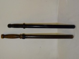 SET OF 2 POLICE BATONS BLACK AND BROWN. ITEM IS SOLD AS IS WHERE IS WITH NO GUARANTEES OR WARRANTY,