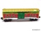 625008 2006 CHRISTMAS LIONEL O SCALE BOXCAR. MEASURES 10 IN LONG. ITEM IS SOLD AS IS WHERE IS WITH