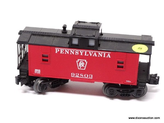 O GAUGE LIONEL 36632 PENNSYLVANIA 92803 CABOOSE. MEASURES 6.5 IN LONG. ITEM IS SOLD AS IS WHERE IS